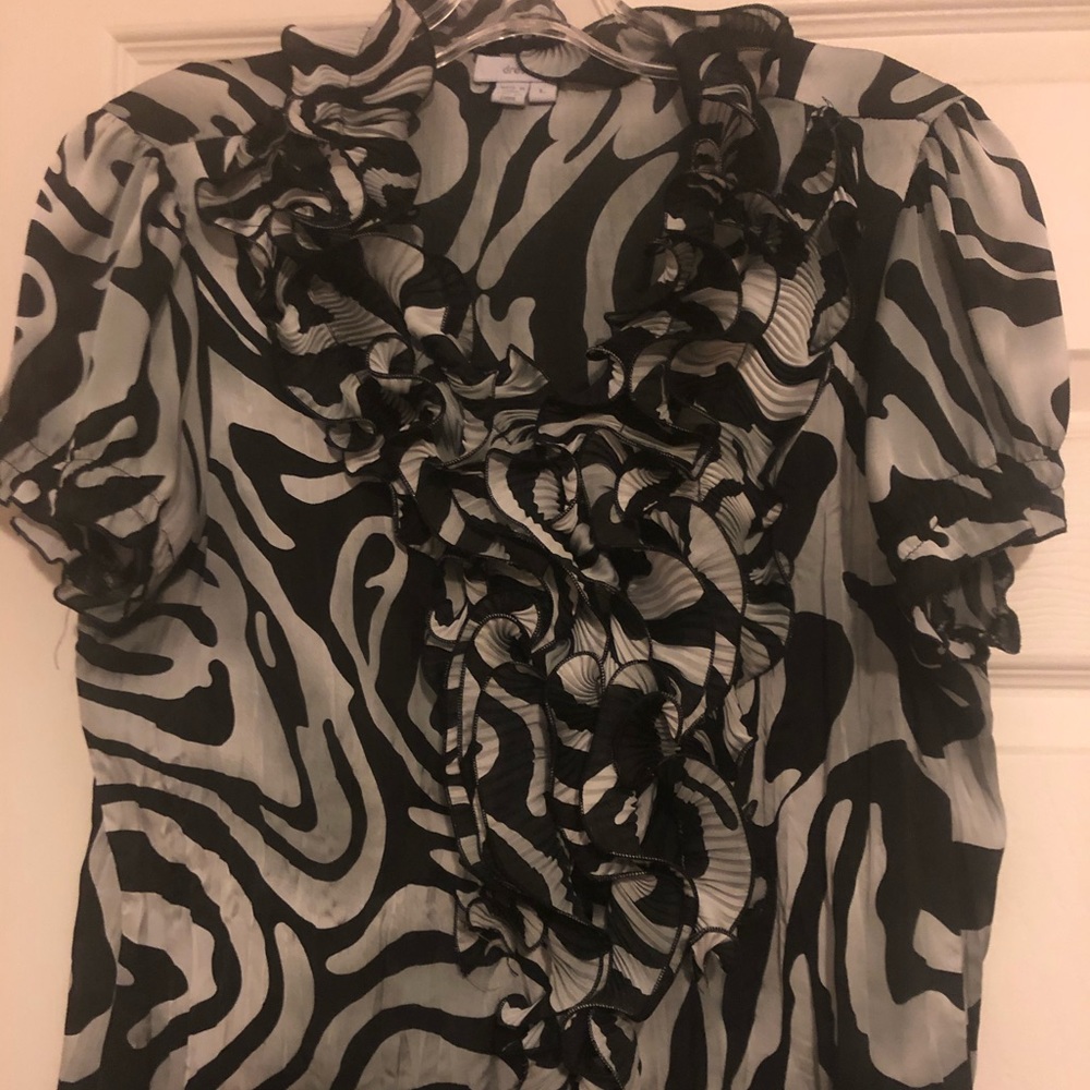 Ruffle shirt in great condition.